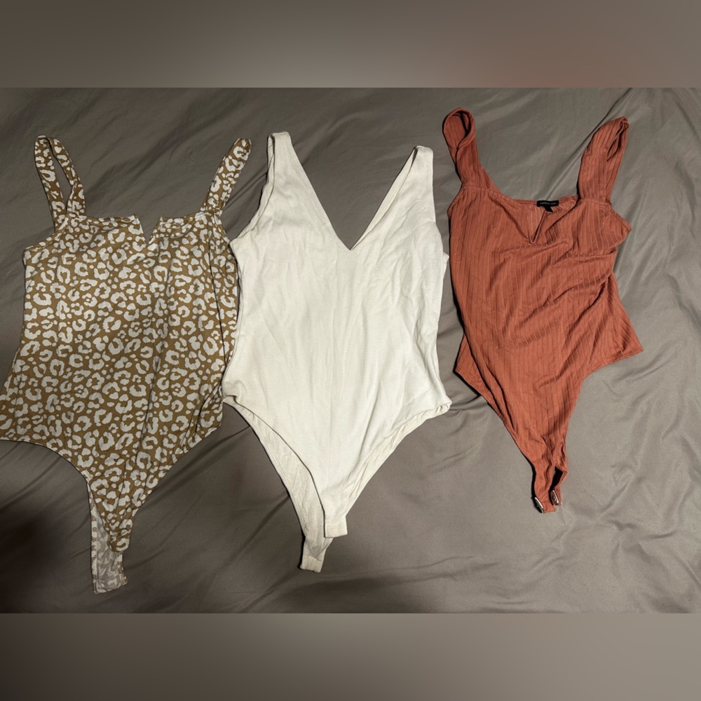 Set of Three Bodysuits in Pink, White, and Leopard Print